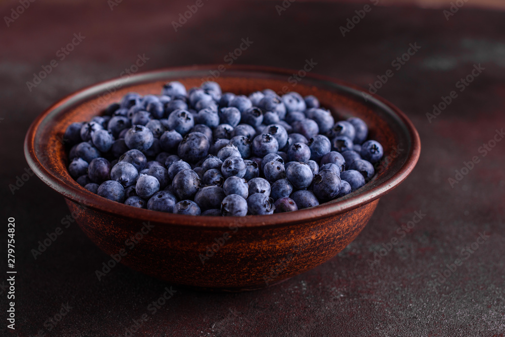 Blueberry antioxidant organic superfood in a bowl concept for healthy eating and nutrition Blueberry antioxidant organic superfood in a bowl concept for healthy eating and nutrition