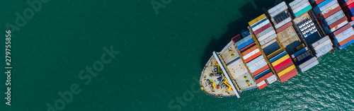 Container cargo ship carrying container for import and export, business logistic and transportation by container ship boat in open sea, Aerial view container ship with copy space for design banner web photo