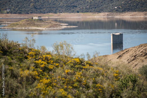 Tower of Floripes submerged in the water of the Tagus in the reservoir of Jose Maria Oriol near Garrovillas de Alconetar photo