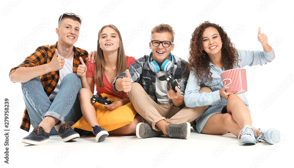 Obraz premium Teenagers playing video game on white background