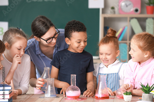 Teacher conducting chemistr...