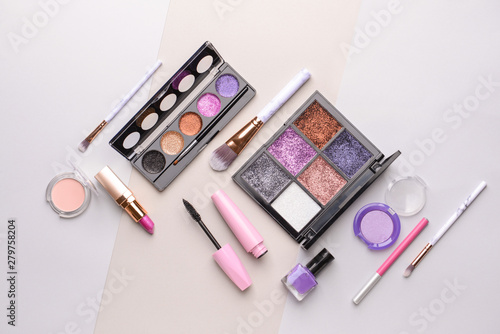 Set of makeup cosmetics on grey background