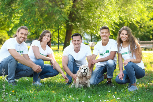 Volunteers with cute dog ou...