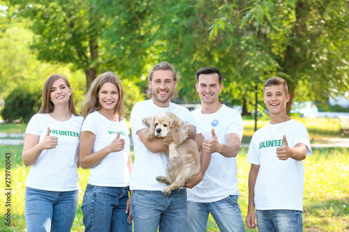 Volunteers with cute dog ou...