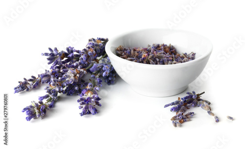 Lavender flowers with bowl on white background