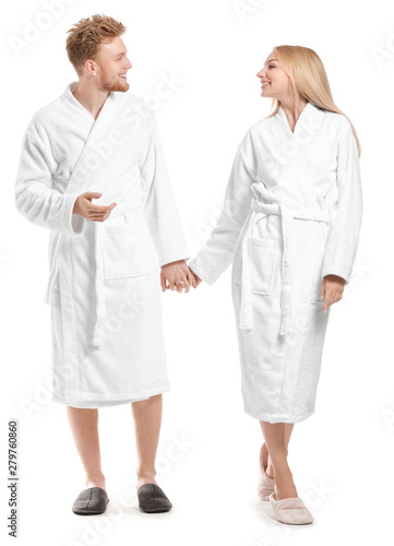 Happy young couple in bathr...