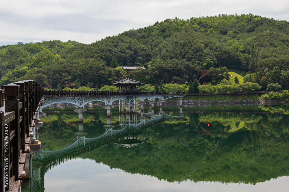 View on Moonlight Bridge, korean Woryeonggyo, and river Nakdong with pedestrians. Andong, North Gyeongsang Province. South Korea, Asia View on Moonlight Bridge, korean Woryeonggyo, and river Nakdong with pedestrians. Andong, North Gyeongsang Province. South Korea, Asia