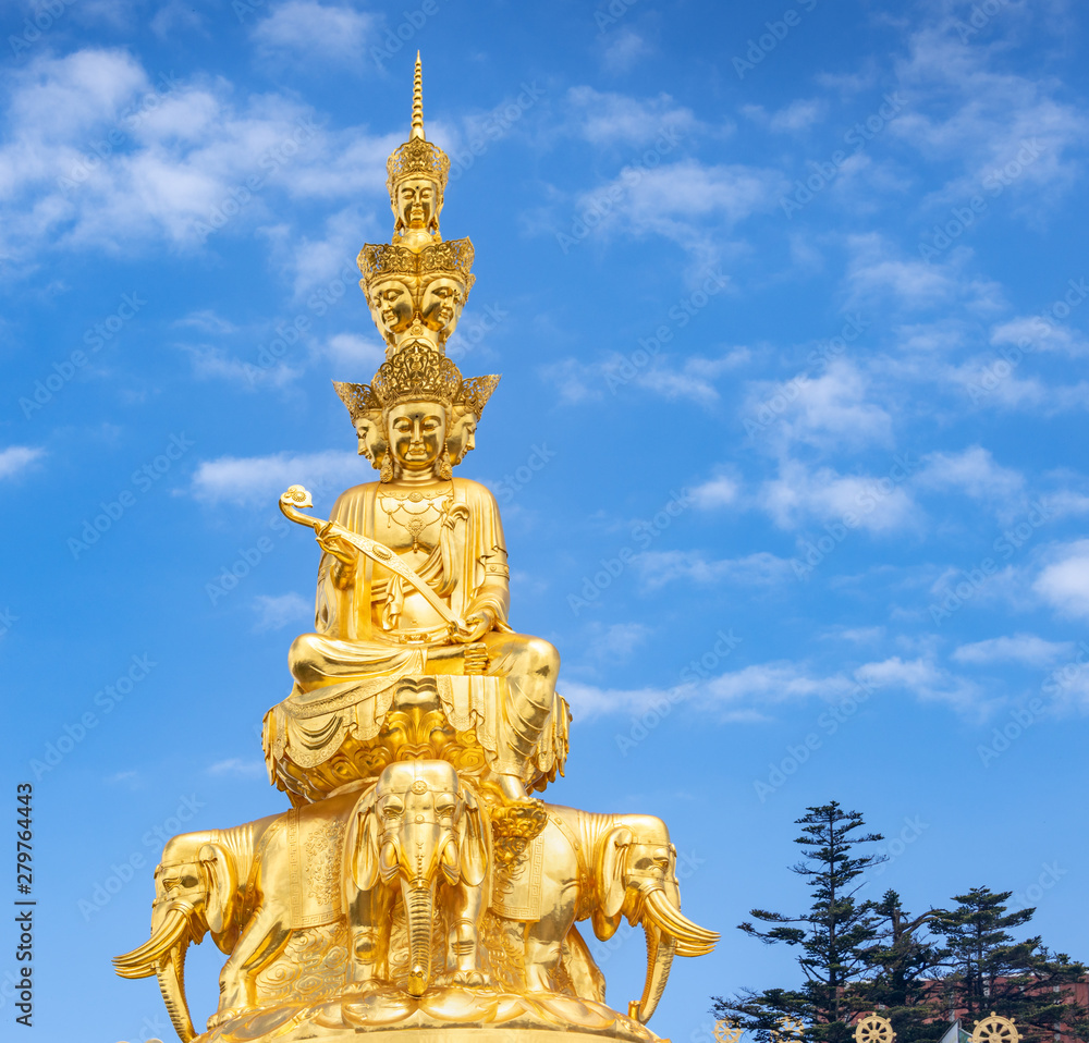 Fototapeta premium Ten-way Puxian gold statue at the top of Emei Mountain in Sichuan Province, China