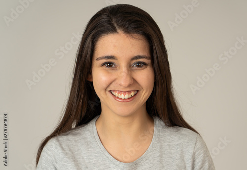 Portrait of young attractive cheerful woman with smiling happy face. Human expressions and emotions