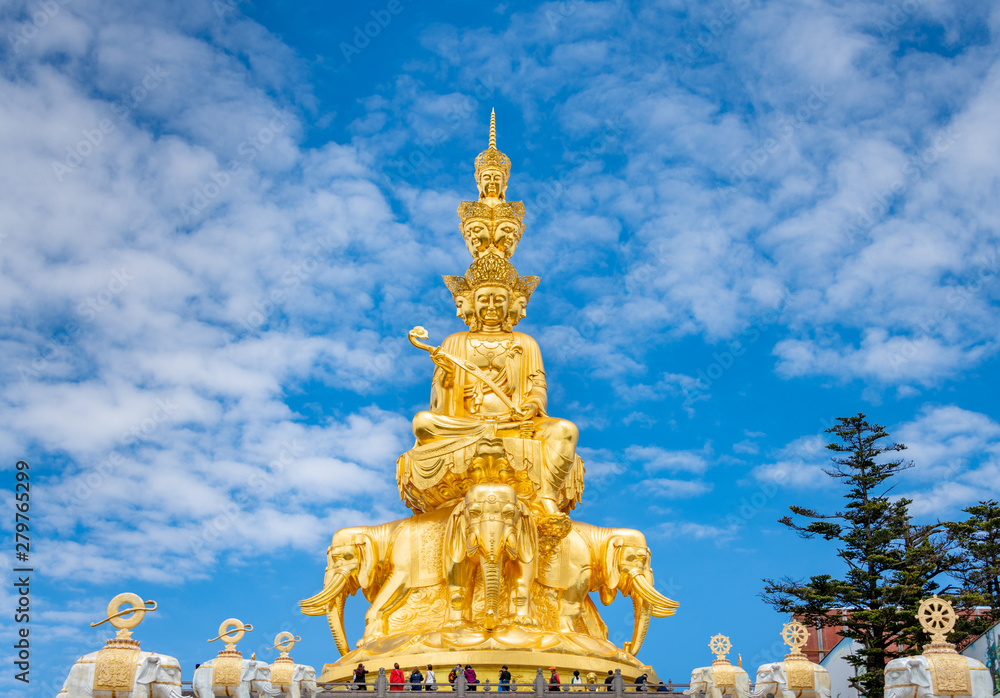 Fototapeta premium Ten-way Puxian gold statue at the top of Emei Mountain in Sichuan Province, China
