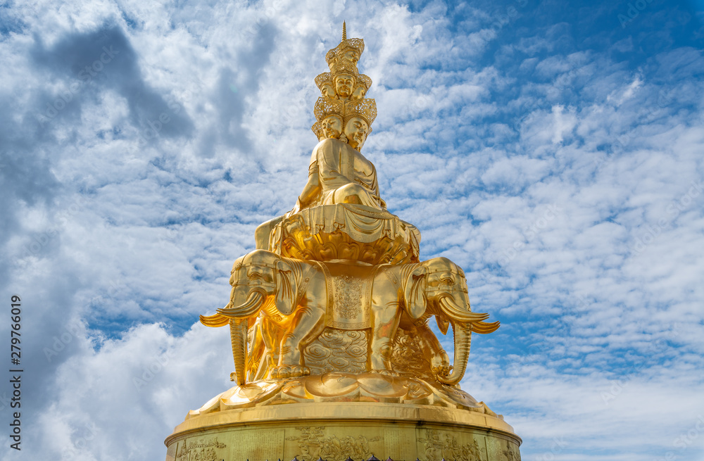 Fototapeta premium Ten-way Puxian gold statue at the top of Emei Mountain in Sichuan Province, China