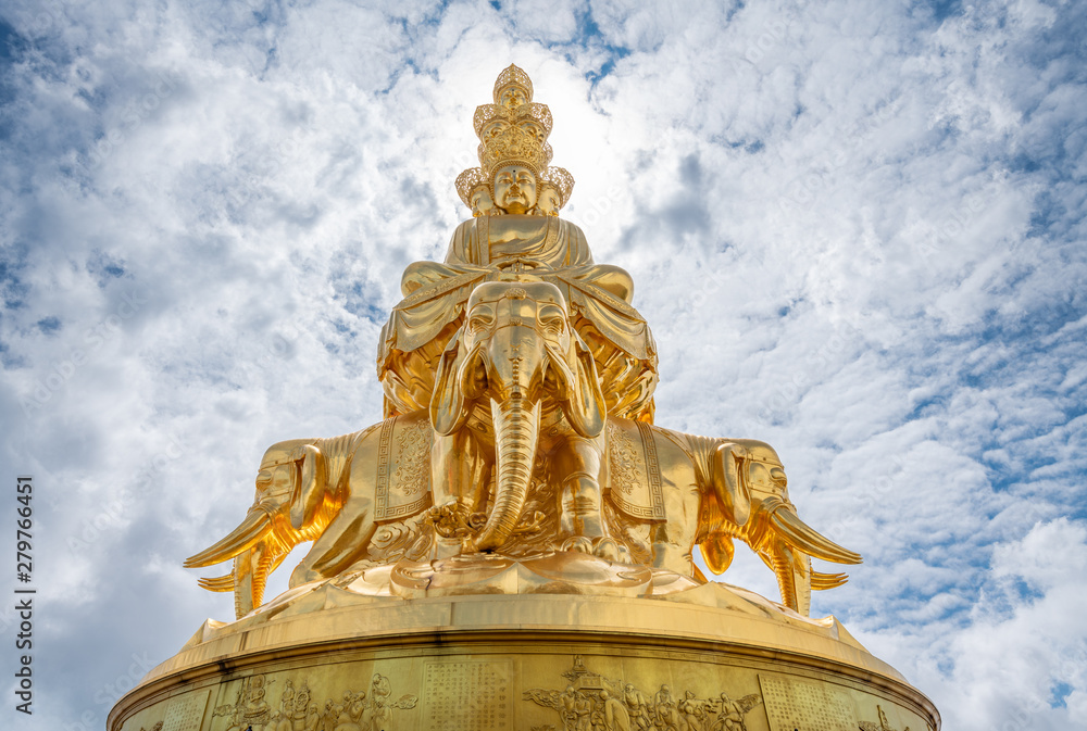 Fototapeta premium Ten-way Puxian gold statue at the top of Emei Mountain in Sichuan Province, China