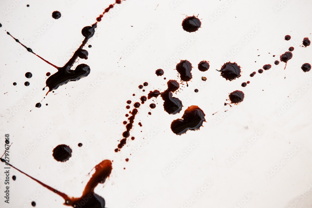 Splattered blood stain on white background Splattered blood stain on white background