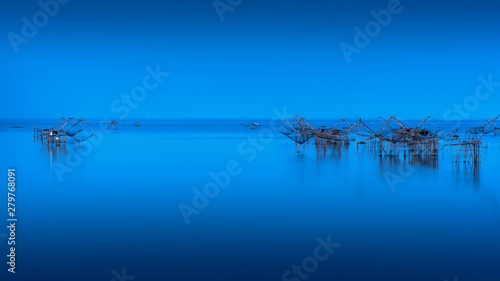 Beautiful landscape and fishing dip nets at Pakpra in Phatthalung, Thailand.