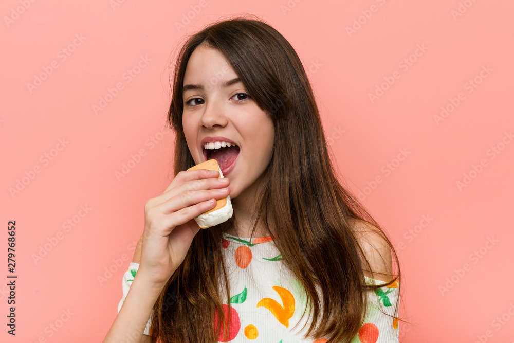 Little caucasian girl holding an ice cream Little caucasian girl holding an ice cream