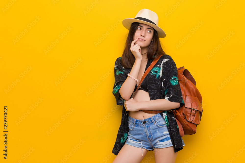 Young caucasian woman wearing a bikini and hat Young caucasian woman wearing a bikini and hat