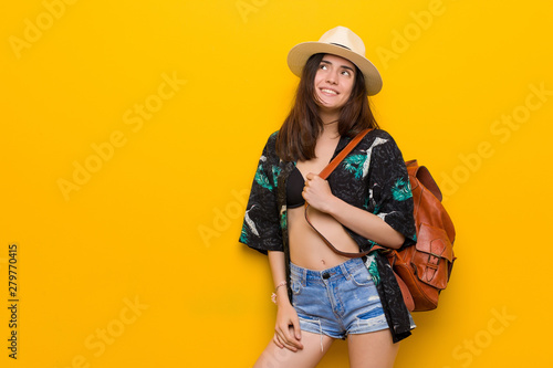 Young caucasian woman wearing a bikini and hat