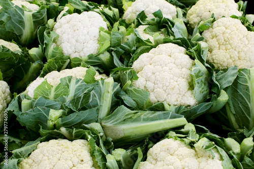 Close up of fresh raw cauliflower bunches at a food market