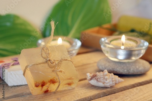  Natural soap, candles, sea salt, plants, stones, shells on the table, spa procedures, relaxation, healthy lifestyle 