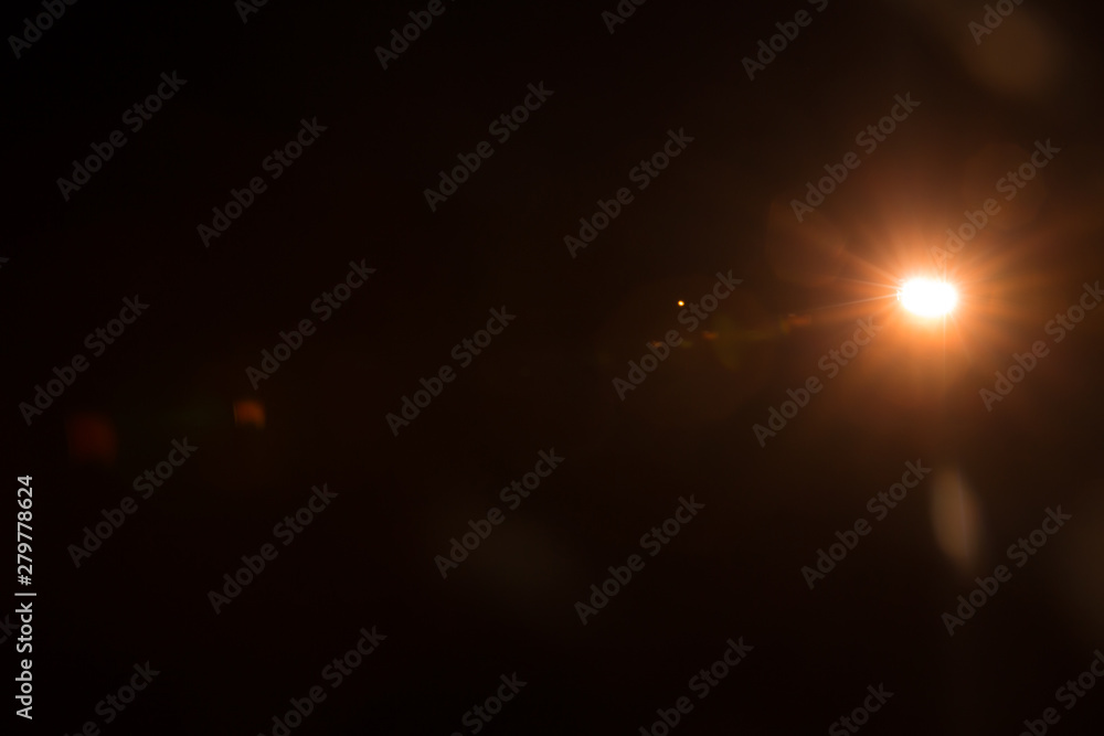 Abstract Natural Sun flare on the black background. Abstract Natural Sun flare on the black background.