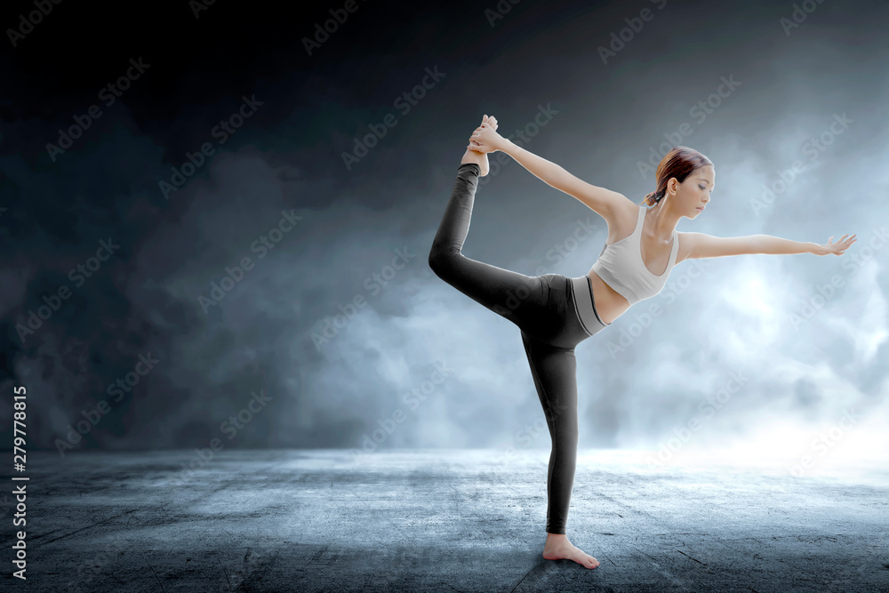 Asian healthy woman practicing yoga on indoor Asian healthy woman practicing yoga on indoor
