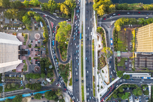 Top down view of road traffic in the heart of Jakarta business district along the Sudirman avenue in Indonesia