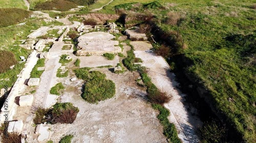 Tel Shikmona is an ancient tell (mound) situated near the sea coast on the modern city of Haifa, Israel. View from the drone of the archaeological site of an ancient settlement. photo