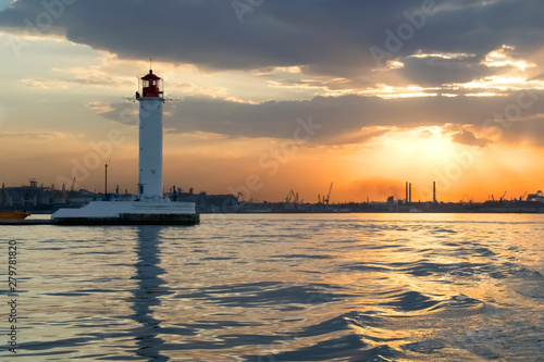 Famous Lighthouse in Odessa port in the sunset, black quite sea in Ukraine, summer landscape