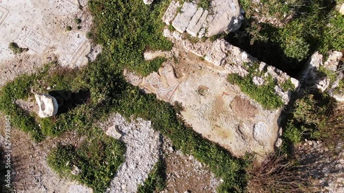 Tel Shikmona is an ancient tell (mound) situated near the sea coast on the modern city of Haifa, Israel. View from the drone of the archaeological site of an ancient settlement. photo