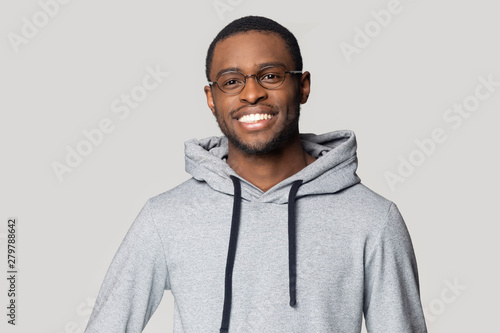 Smiling black male in hoodie posing for picture