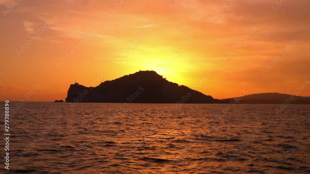 Ischia island in Italy view from the sea at sunset Ischia island in Italy view from the sea at sunset