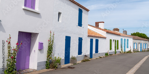 Picturesque street with white houses in France in web banner template