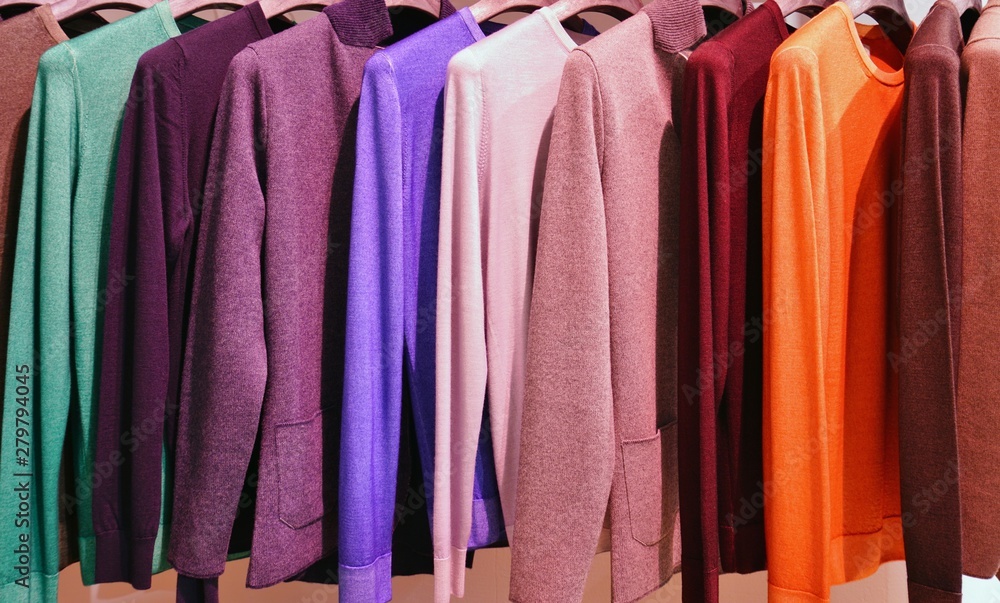 Colorful hanging display of cashmere sweaters in Italy