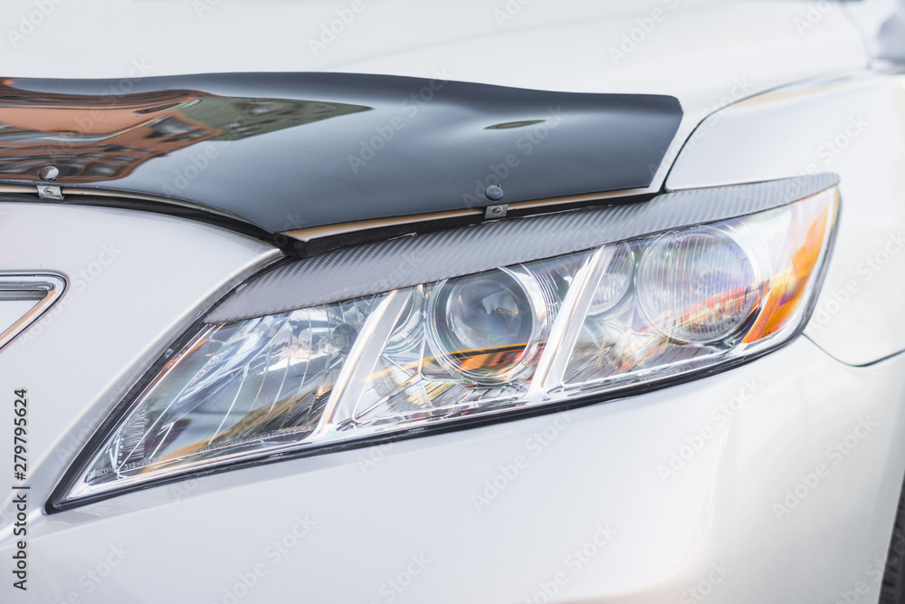Modern led headlight ofÂ silver car
