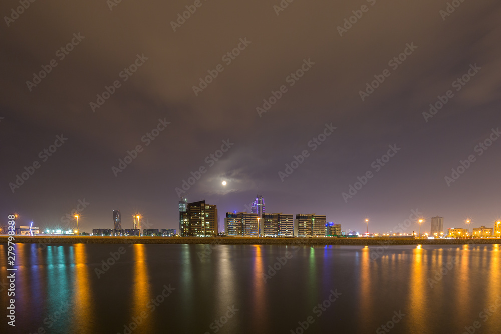 Bahrain skyline at night with beautiful reflections and striking illuminations