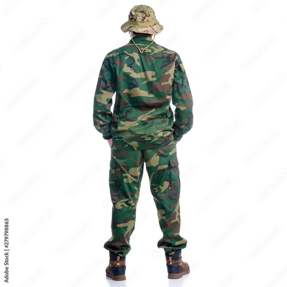 Man in camouflage clothes hiking standing looking on white background isolation, back view Man in camouflage clothes hiking standing looking on white background isolation, back view