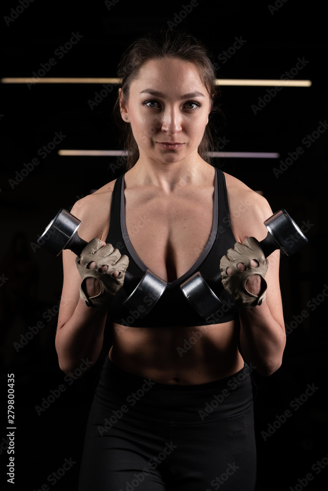 Pretty young sport woman is Workout in gym, Healthy lifestyle Pretty young sport woman is Workout in gym, Healthy lifestyle
