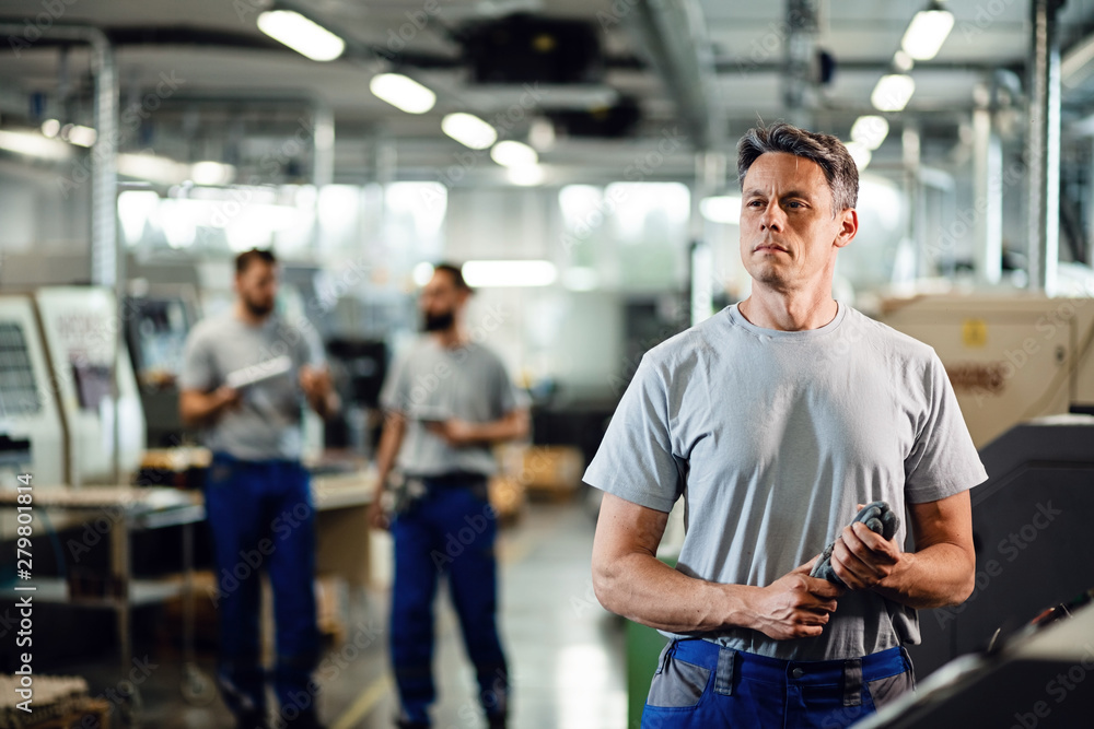 Industrial facility engineer at production line. Industrial facility engineer at production line.