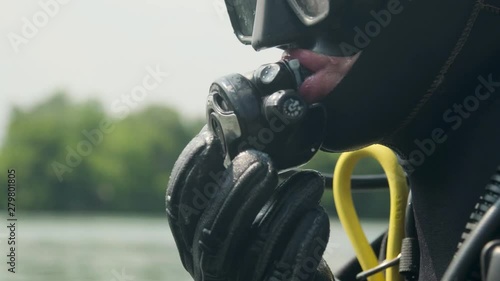 scuba diver preparing to dive. Portrait of a scuba diver with all of the equipment