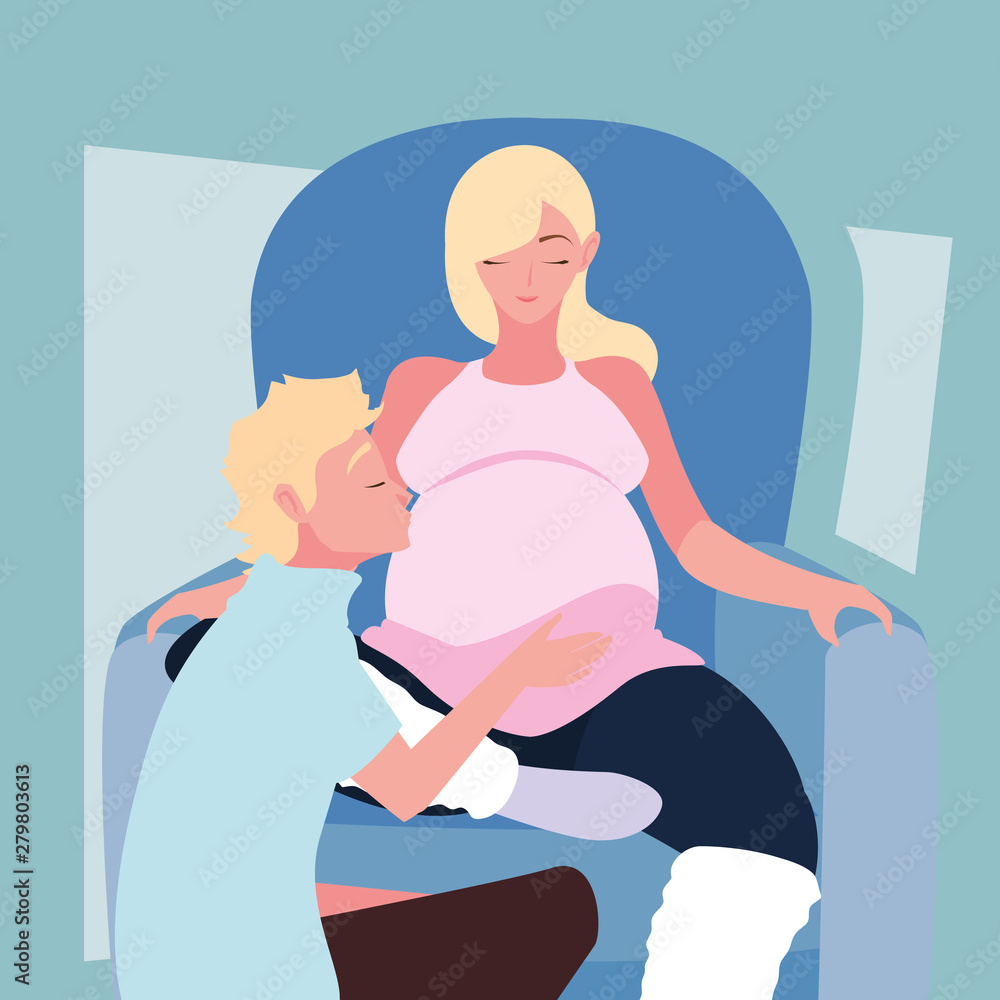 pregnant wife sitting in sofa with husband pregnant wife sitting in sofa with husband
