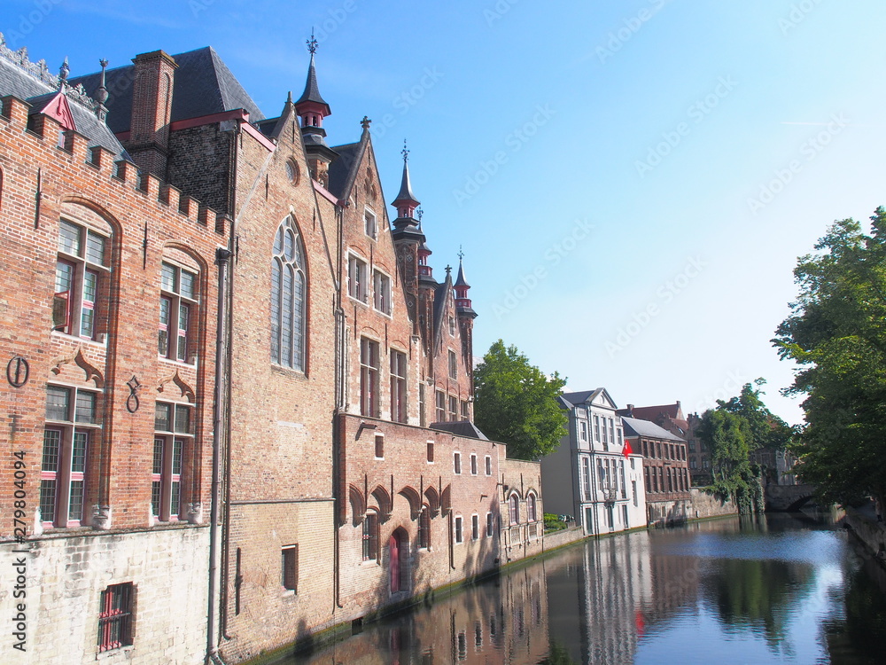 Naklejka premium Bruges cityscape with water canal and bridge, Flanders, Belgium