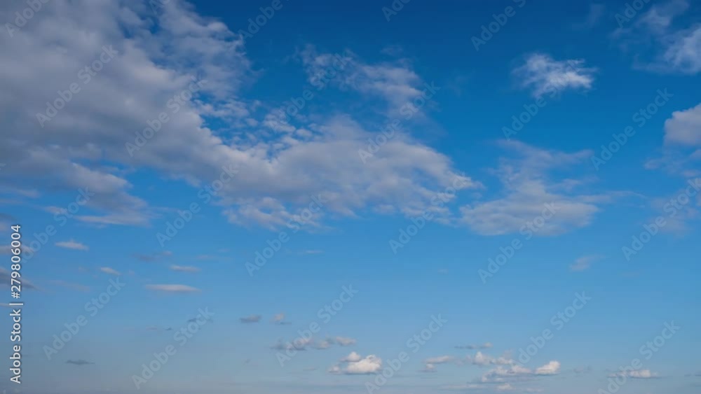 Sunny blue sky and moving white clouds. Beautiful cloud flying in blue sky, timelapse video. Sunny blue sky and moving white clouds. Beautiful cloud flying in blue sky, timelapse video.