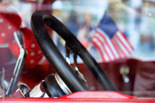 Salon of vintage car with flag of USA