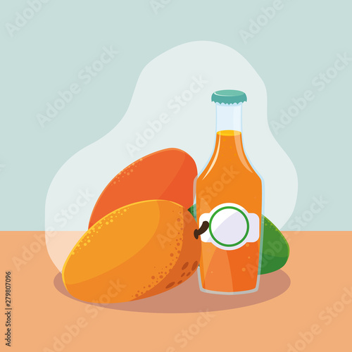 fresh mangoes with bottle of juice natural