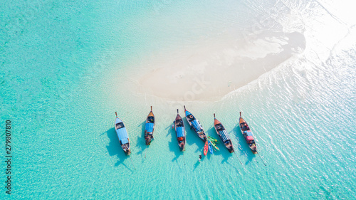 Top view or aerial view of Beautiful crystal clear water and white beach with long tail boats in summer of tropical island or Koh Lipe in Satun,Southern Thailand 