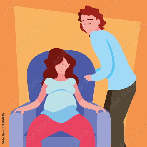 pregnant wife sitting in sofa with husband