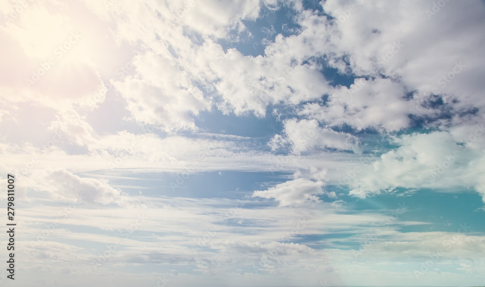 Obraz premium Blue sky clouds background. Beautiful landscape with clouds and sun