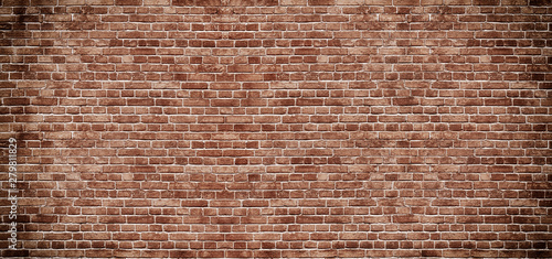 Panoramic background of wide old red brick wall texture. Home or office design backdrop © uv_group