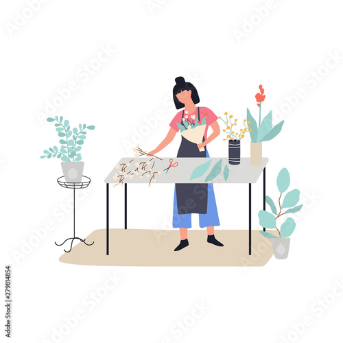 Woman florist making flower bouquet. Creative occupation