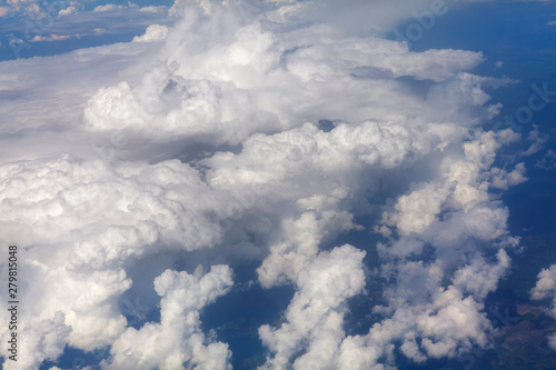flight near beautiful white clouds © russieseo